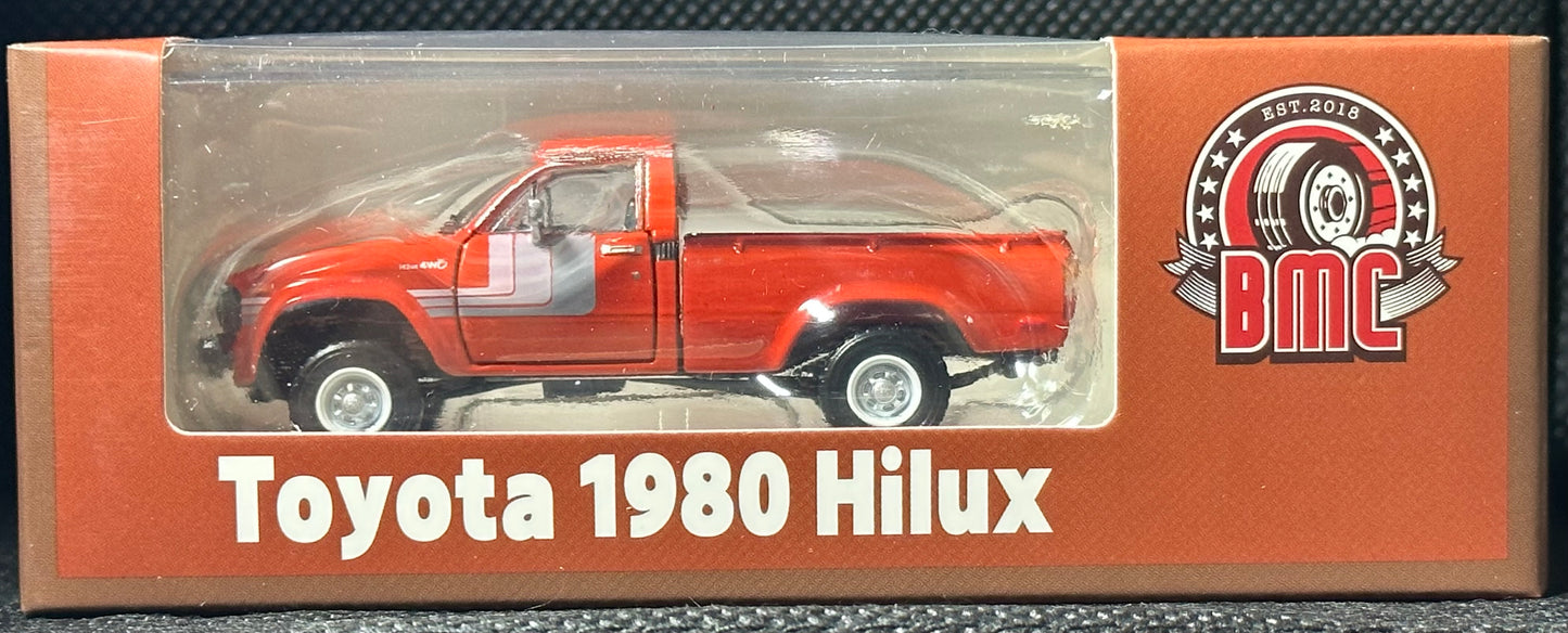 BM Creations 1/64 Toyota 1980 Hilux N60, N70 Orange (LHD)